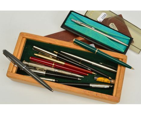 A SELECTION OF PENS, to include mainly Parker ballpoint pens, together with an engine turned 'four in hand' retractable penci