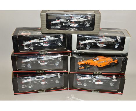 A QUANTITY OF BOXED MINICHAMPS DIECAST 1/18 SCALE MCLAREN FORMULA 1 RACING CARS, many from the McLaren Collection, all are mo