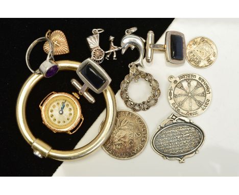 A SELECTION OF SILVER AND WHITE METAL JEWELLERY, to include a pair of silver cufflinks, an early 20th Century watch head, a m