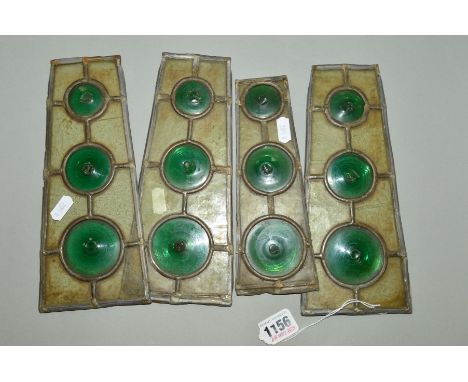 FOUR LEADED LIGHT WINDOW PIECES, each having three green 'Bulls Eyes' to the centre, each measuring approximately 24cm high, 