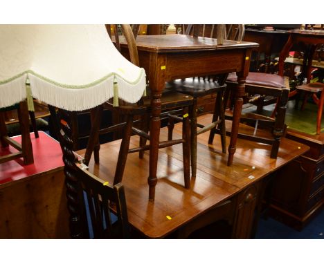 AN ART DECO OAK GATE LEG TABLE, three spindle hoop back chairs, two other chairs, an oak table and a barley twist standard la