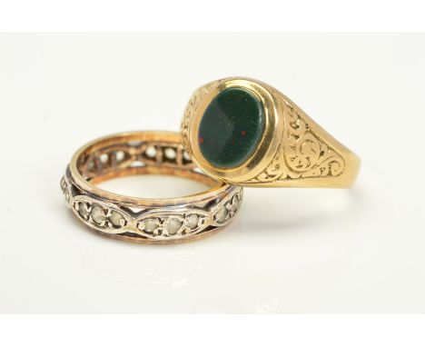 TWO RINGS, the first a bloodstone signet ring, ring size O, the second a paste eternity ring, stamped 9ct &amp; Sil, approxim