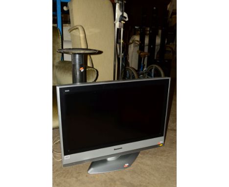 A PANASONIC LCD 32'' TV (REMOTE), together with a Bush DVD player, chrome uplighter standard lamp and chrome mesh floor lamp 