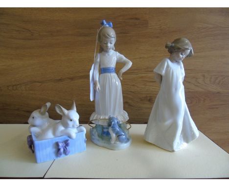 TWO NAO FIGURES OF GIRLS &amp; DOGS IN A BASKET EST [£12- £25]