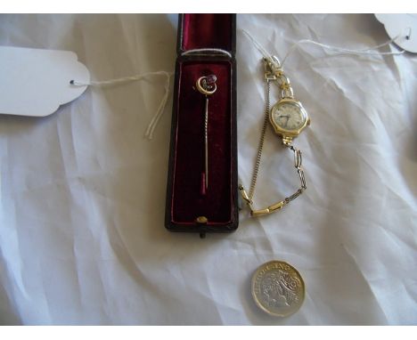 9CT GOLD &amp; GARNET STICK PIN &amp; A ROLLED GOLD LIMIT WIND UP WRIST WATCH EST [£15- £25]