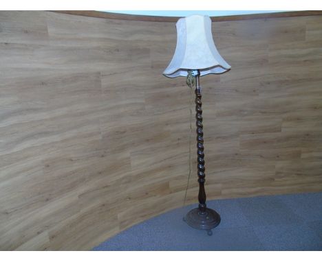 STAINED BEECH STANDARD LAMP SUPPORTED ON A BARLEY TWIST COLUMN EST [£20- £40]