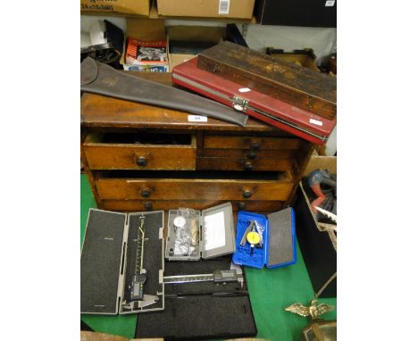 A Mahogany table top engineers tool cabinet, with contents, & a selection of boxed small tools