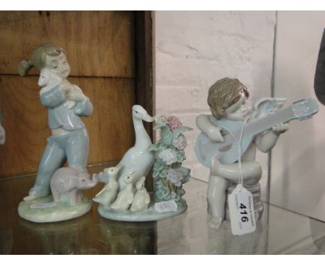 Lladro cherub musician, ducks group, & a NAO girl with toys