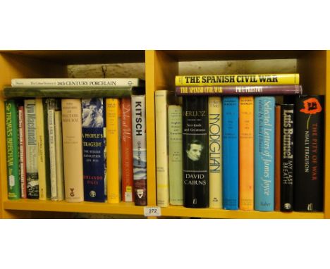 Shelf of hardback reference books including the Spanish Civil War, The Memories of Hector Berlioz