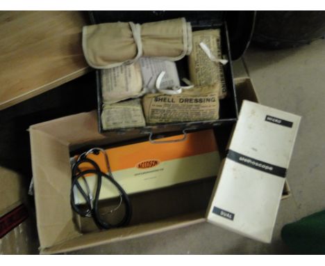 A wartime First Aid tin & contents, 2 stethoscopes etc