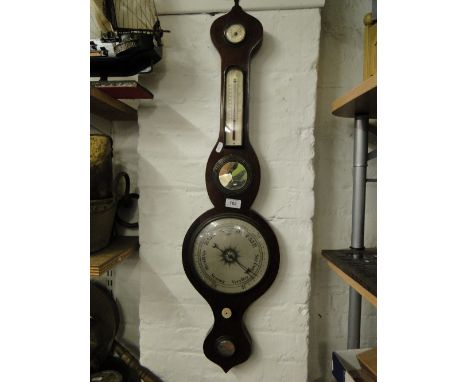 An Aneroid barometer, with integral spirit level, hygrometer & thermometer