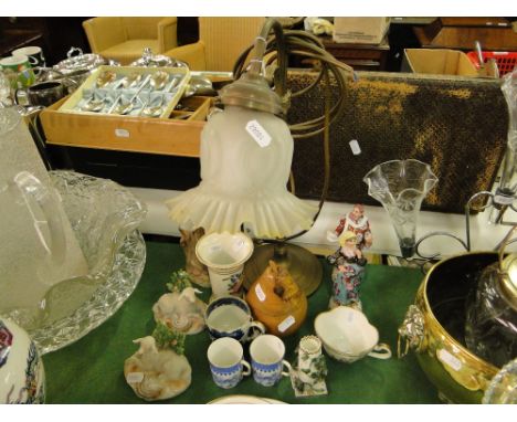 A brass desk lamp, a treen pear shaped box, Staffordshire figures, etc