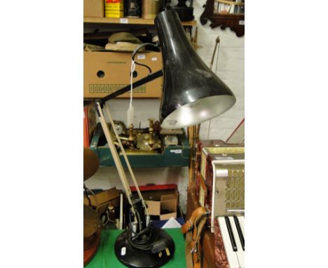 An angle poise lamp