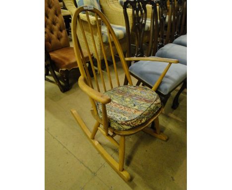 An Ercol stickback rocking chair