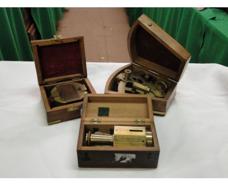 2 reproduction brass instruments in wooden cases, & a boxed compass
