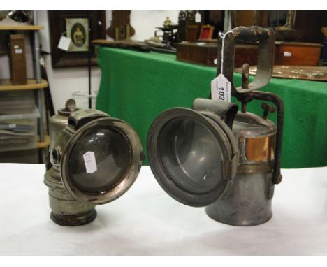 A Lucas lamp & a Premier acetylene lamp with turned wood handle