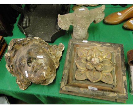A framed gilded architectural fitting, a mask & a stand (3)