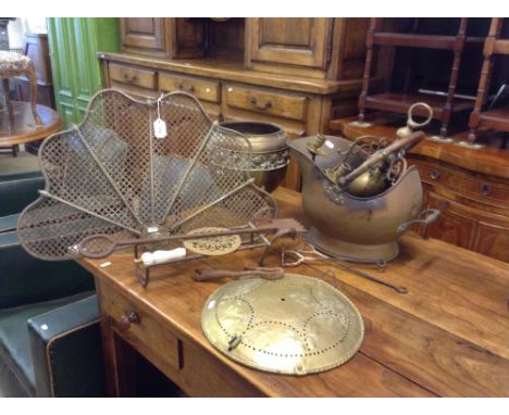 Brass coal helmet, mesh fire screen, jardiniere, branding irons etc