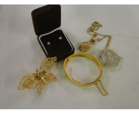A Silver gilt filigree muff brooch, engraved bangle, pendant, etc