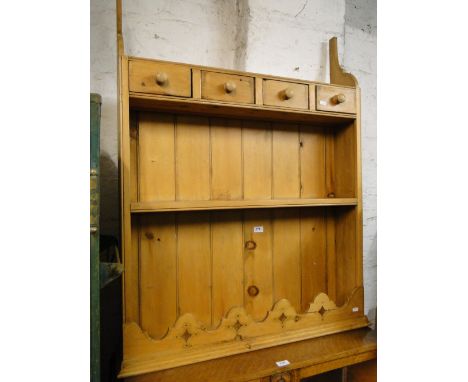 A Pine hanging plate rack with spice drawers