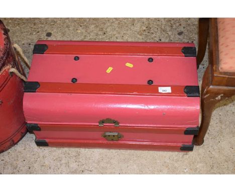 A vintage painted metal trunk