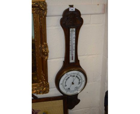 A late Victorian oak cased barometer
