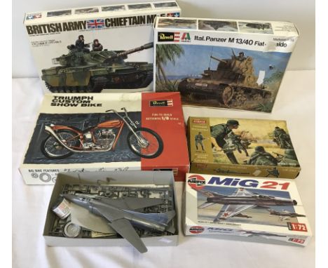 4 boxed part made plastic kits together with a boxed Airfix 1:32 scale German Infantry.  