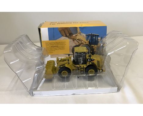 A boxed 1:50 scale Cat 950H Wheel Loader.  