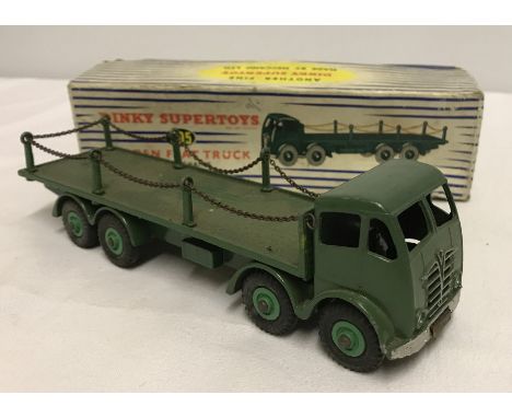 A boxed Dinky Foden Flat Truck with chains #905. 2nd type cab (1954-58). Green with light green hubs. Lorry very good, minor 