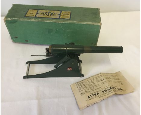 A boxed Astra 12 inch Howitzer. With 5 rubber 'shells' and instruction leaflet. Fires projectiles by use of caps. Box has int