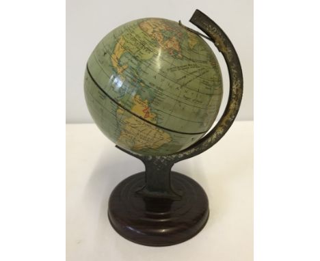 A c1950's Chad Valley tinplate globe. No. 10028. By appointment to HM The Queen on stand. Pakistan not present which normally