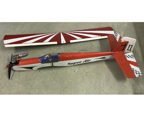 A large petrol engine radio controlled plane - Red & white colours 'Super Air'.  Length 124cm, wingspan 133cm