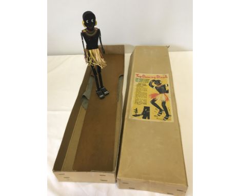 A boxed c1940-50's Tap Dancing Dinah wooden puppet.  