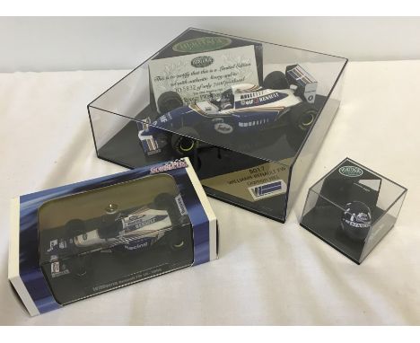 2 boxed Williams Formula 1 racing car & helmet diecast models. Comprising:- Limited edition Williams Renault FW16 car - Damon