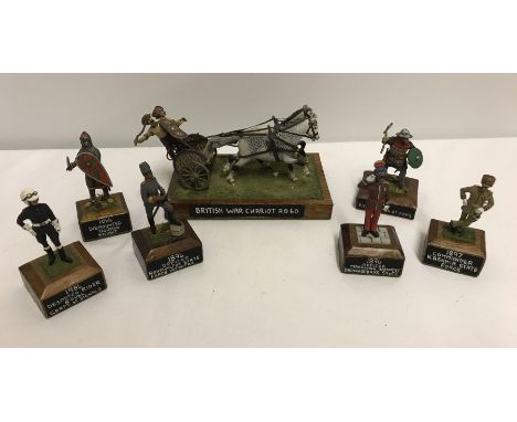 7 x white metal/lead historical figures on bases. Approx 56mm scale. 