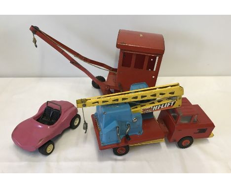 3 Tri-ang & Tonka tinplate large scale vehicles. Comprising:- a Tri-ang Hi-Way Hi-Lift breakdown truck, a Tri-ang crane, and 