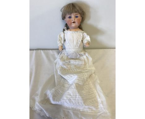 Antique bisque Armand Marseille doll with unusual lilac eyes. Head marked Armand Marseille, Germany 990, A.3.M.  Has composit