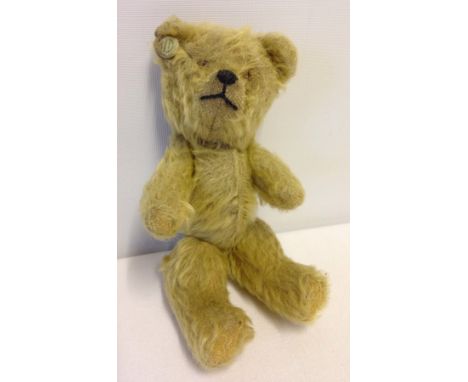 Vintage Chad Valley small blond mohair teddy bear c.1930's with button. Fully jointed. Button says 'Chad Valley British Hygen