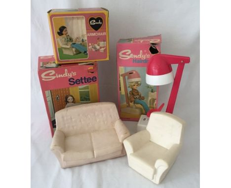 A boxed Sindy white sofa and boxed matching armchair. Together with a boxed Sindy hairdryer. 