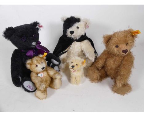 Four Steiff teddy bears and one Steiff dog, all with buttons in ears, and labels attached, to include Queen Elizabeth II memo