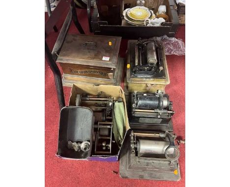 A collection of various phonograph players, and a box of spare partsWooden case is empty.