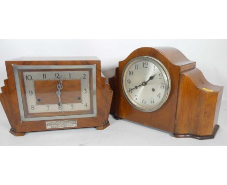 An Art Deco style mantel clock with plaque to front, reading "Presented by the staff of Henry and Leigh Slater, Bollington an
