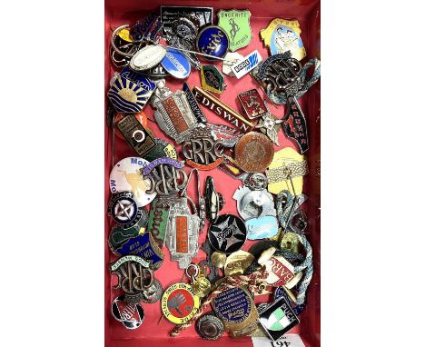 A collection of motoring badges to include Brands Hatch, Brooklands Automobile Club, Wolseley and Dagenite Accumulators