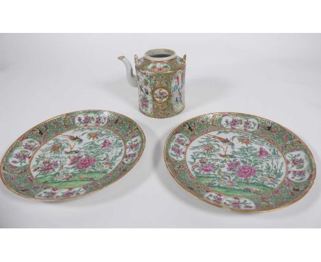 A Chinese famille rose teapot (lacking cover) and two plates in famille rose palette (3)Teapot: Chip to lid of spout. Cracks 