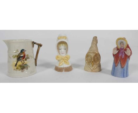 Three Royal Worcester candle snuffers, together with a Royal Worcester miniature jugNo apparent cracks or damage.