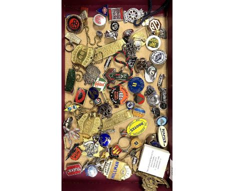 A collection of motoring badges to include Jeep, MG, Brough Superior and Goodwood Festival Of Speed