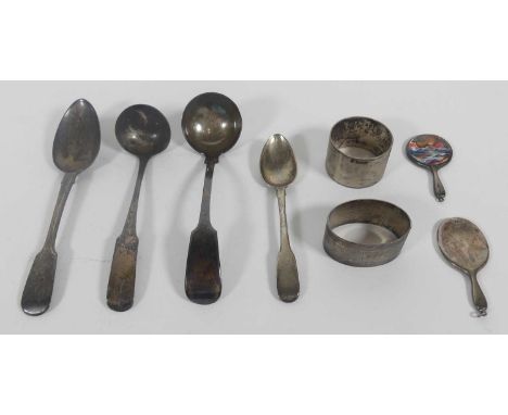 A collection of silver and plated items to include flatware, napkin rings, and miniature dressing table mirror, weighable sil