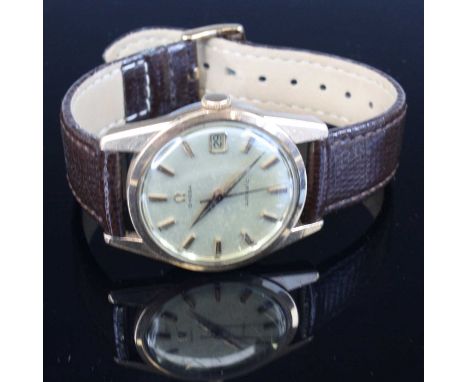 A gent's Omega gold plated automatic wristwatch, circa 1960s, having a signed champagne dial, baton markers and sweep centre 