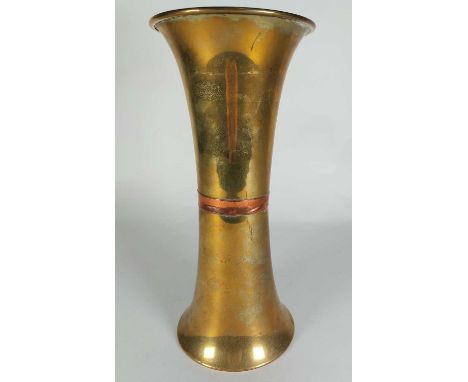 A Trench Art brass trumpet vase