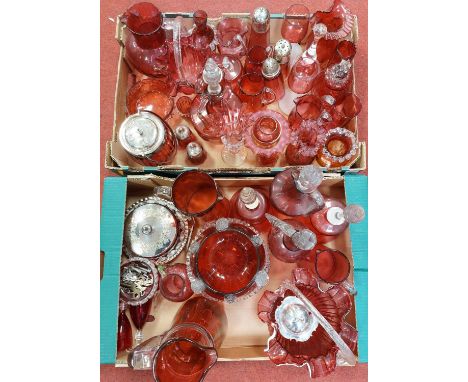 A collection of Victorian and later cranberry glass, to include cribbage set, wyvern sugar caster, table basket, decanrters a